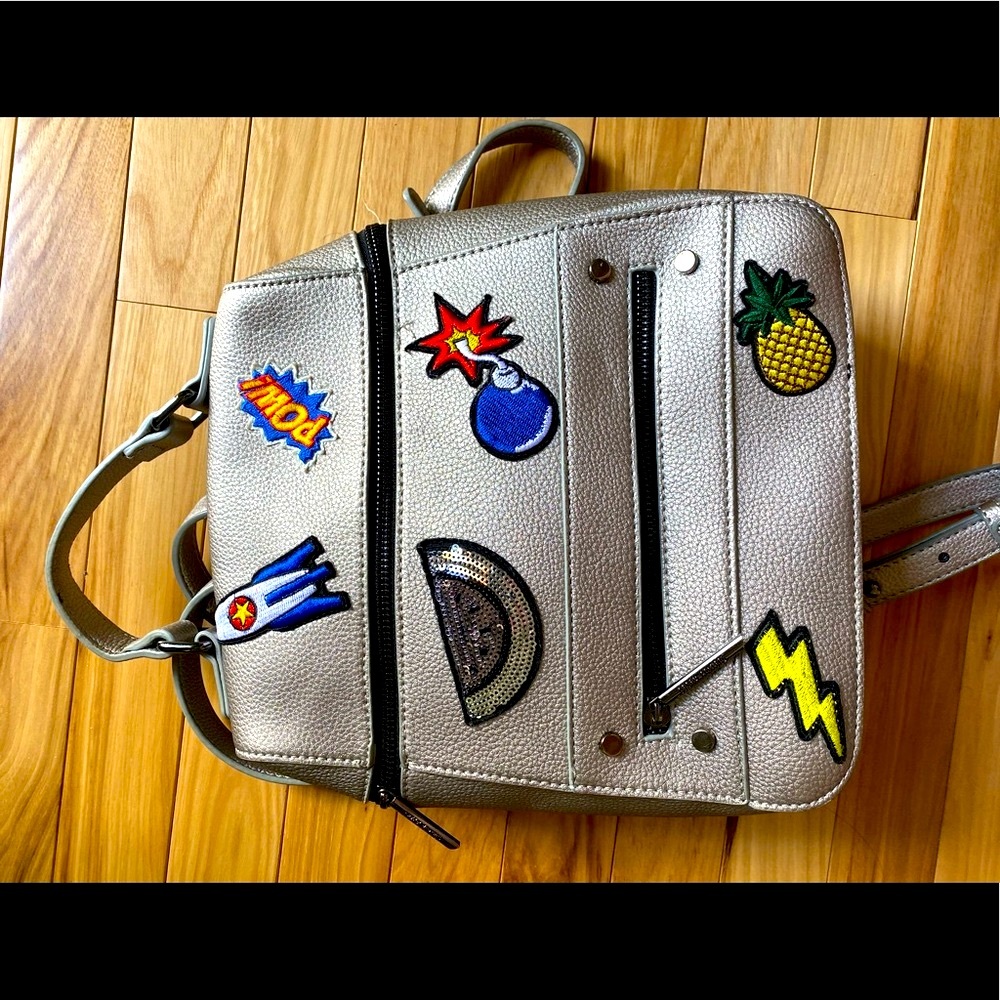 NWOT DREAM CONTROL SILVER BACKPACK WITH PATCHES